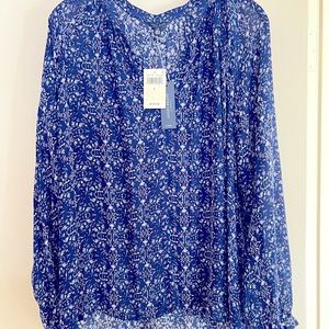 Lucky Brand blue blouse in large with one button closure on the sleeves